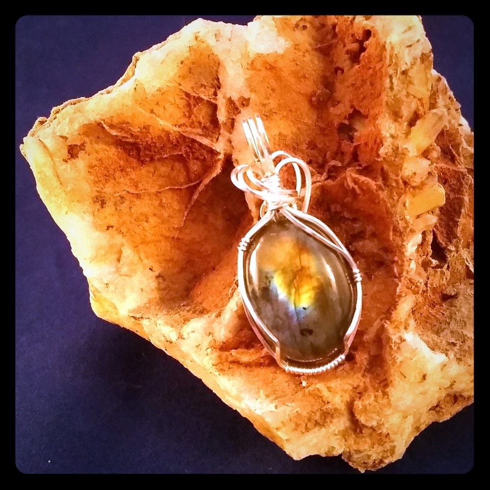 Handmade wire wrapped stone pendant